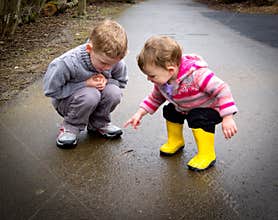 Children watch worm