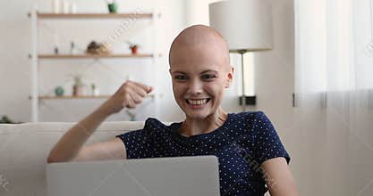 Bald woman use laptop read email great news feels happy