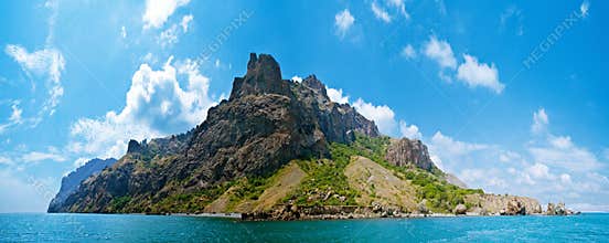 Mountain on island in sea