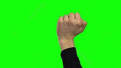 Arm of a male is knocking. Chroma key. Close up