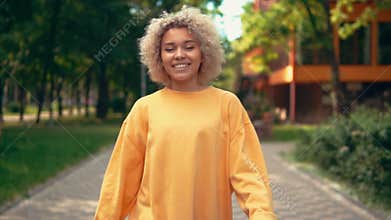 Blonde girl walk in city