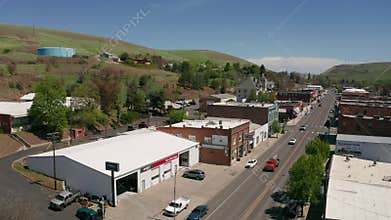An aerial view over a small town that is very long and slim in Eastern Washington state