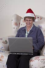 Mature Senior Woman Online Christmas Shopping