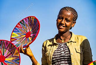 Aksum, Ethiopia - Feb 09, 2020: Ethiopian girls selling baskets in the Aksum basket market in Aksum