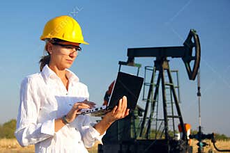 Female engineer in an oilfield