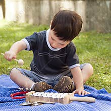 Child with musical instruments
