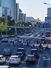 Beijing morning rush hour, students crossing street