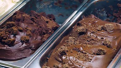 Footage showcases a visually enticing gelato ice cream tray filled with a variety of flavors.