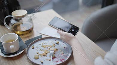 paying check qr-code smartphone in cafe after lunch using phone scanning qr code