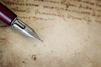 Vintage Nib Pen over Grunge Text