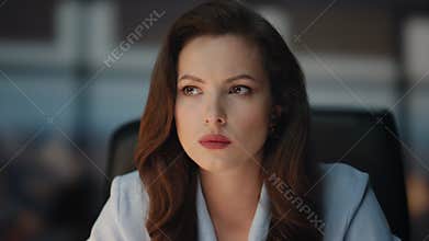 Woman boss thinking face at evening cabinet closeup. Businesswoman pondering