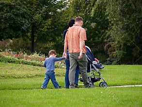 Happy Family Enjoying In The Park