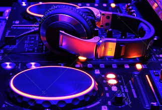 Dj mixer console at work