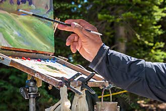 Painter Hand Brush and Easel