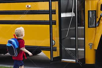 Child getting on a school bus