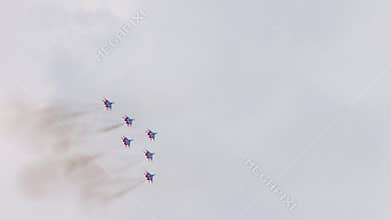 Group military airplanes flying war. Fighter smoke jets mig29 sky stunt air show