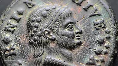 Ancient Roman Coin: Detailed Macro View of Historical Artifact