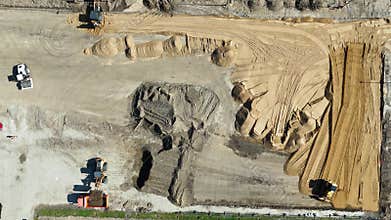 Aerial View of Construction Site with Heavy Machinery