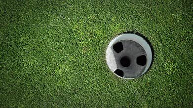 Ball rolling into the hole