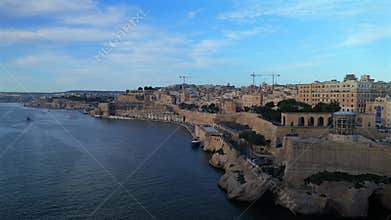Valletta's Grand Harbor and Historic Fortifications at Sunrise