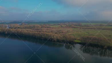 Dutch landscape with rivers and lakes seen from above in sunny spring weather 4k