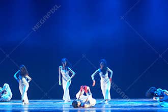 Minimal Contemporary Dance Formation on Blue Theater Stage