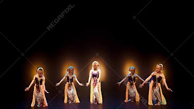 Traditional Dance Ensemble Illuminated by Warm Stage Spotlights