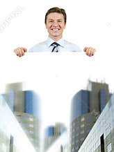 Business man holding a white board with corporate