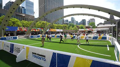 Toronto, Canada - May 26, 2026: mini football gathering in Toronto park. Youth and families enjoy casual