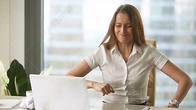 Stressed female employee throwing crumpled paper, nervous breakdown at work