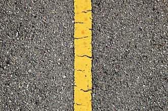 Asphalt Road With Yellow Strip