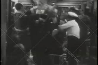 People attempting to exit sinking ship