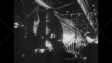 Employees working in munitions factory, 1940s