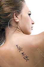 Tattoo on a back of the woman