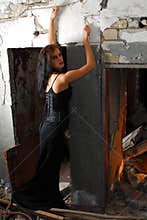 Goth woman in old building