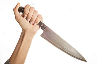 Knife in hand ready to stab