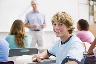 A schoolboy in a high school class