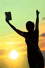 Female praying with bible #3