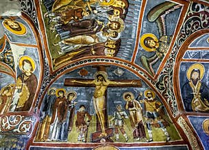 A beautiful fresco showing the Crucifiction of Christ at the Open Air Museum at Goreme in Cappadocia in Turkey.