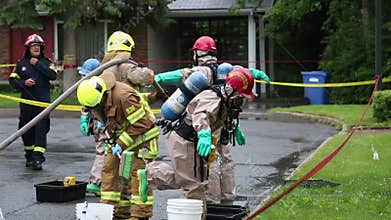Hazmat team decontamination washing process.