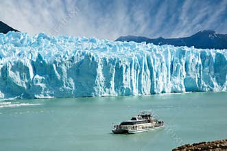 Boat sailing near Perito Moreno glacier.