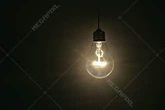 Light bulb on dark background