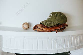 Baseball cap, ball and glove