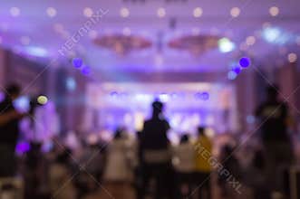 Cameraman recording video of Wedding fair out of focus,blur bac