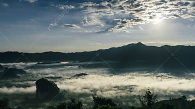 Time Lapse Beautiful Sunrise. Mist and Cloudscape Over The Mountain.