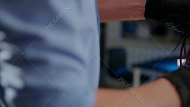 Hairdresser coloring hair in studio