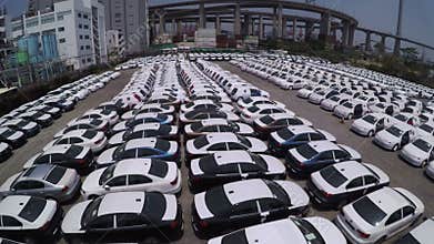 Many new cars storage 4K aerial shot.