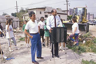Mayor Tom Bradley overseeing urban cleanup efforts on Earth Day