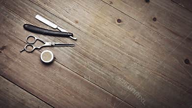 Vintage barber tools on wood table