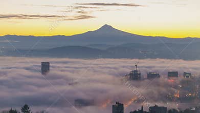 Time Lapse of Rolling Fog and Low Clouds over City of Portland Oregon with Snow Covered Mount Hood Early Morning at Sunrise 1080p
